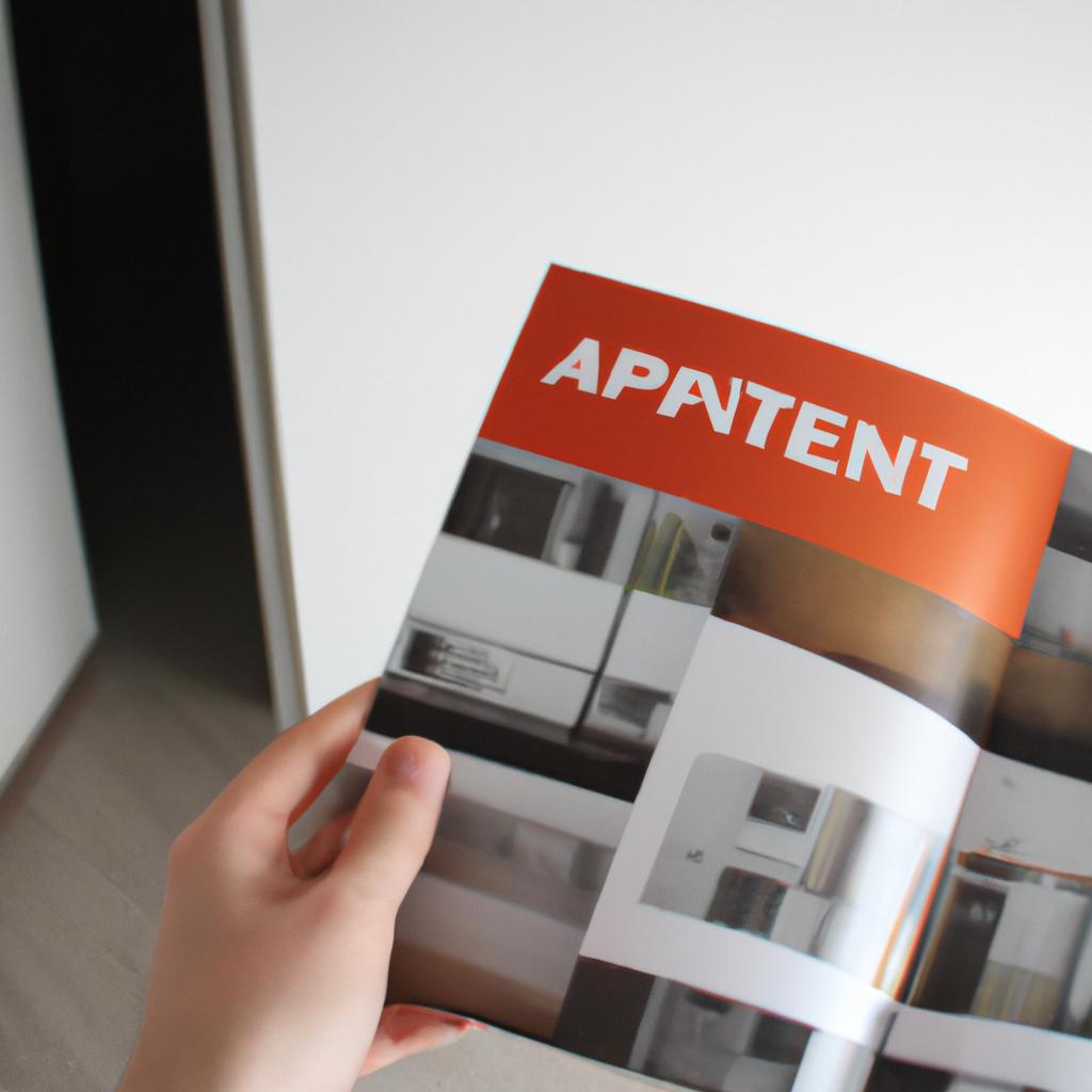 Person holding apartment rental brochure
